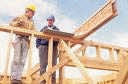 Engineers reviewing plans on a construction site